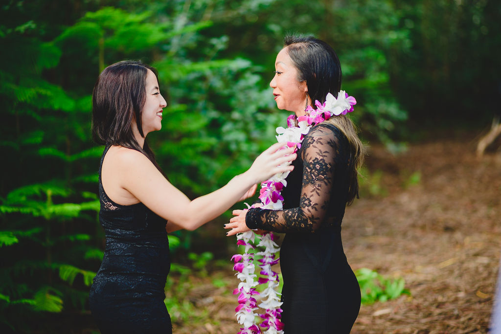 Two brides to Hawaiian lei exchange